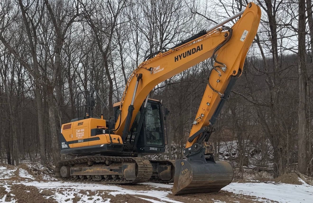Hyundai HX160L excavator with grading bucket