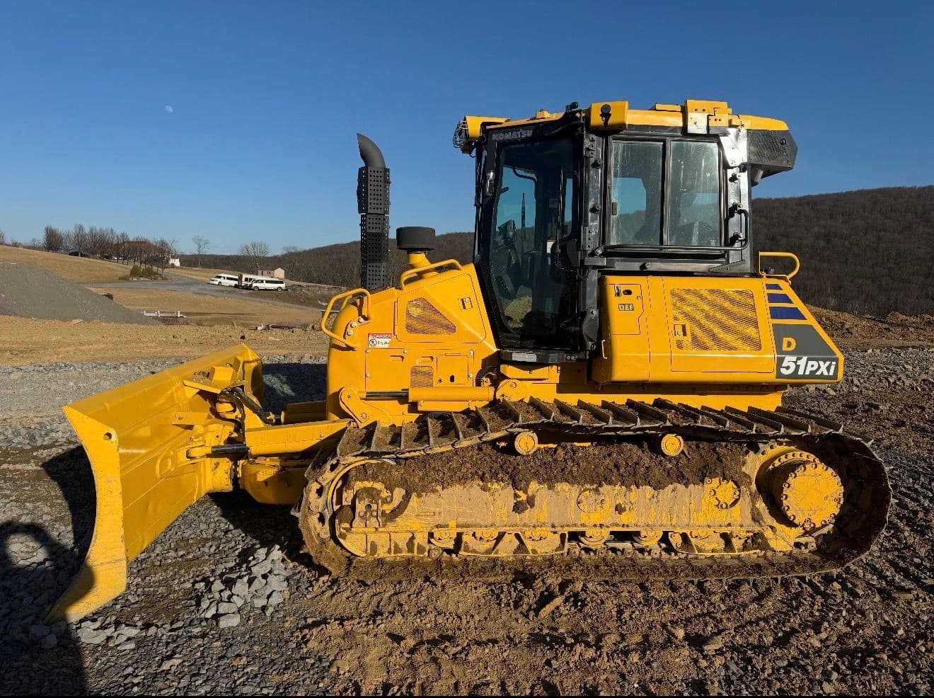 Komatsu D51PXi dozer on a graded stone pad